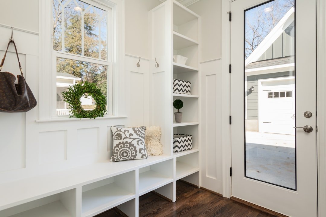 A neatly organized home space with labeled storage bins and tidy shelves, showcasing simplicity and efficiency in everyday life.