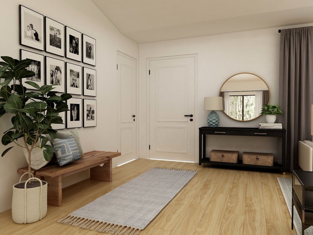 A well-organized entryway with hooks, shoe storage, and a welcoming mat, showcasing a tidy and functional space.