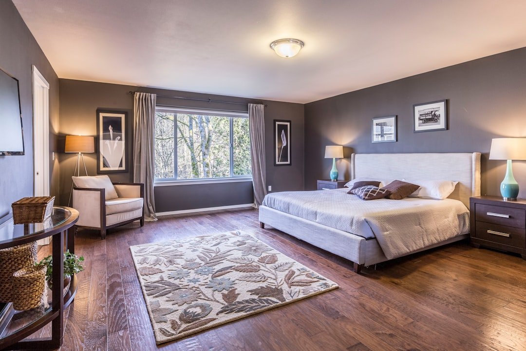 A serene and tidy bedroom with minimal decor, showcasing smart storage solutions and a calming atmosphere.