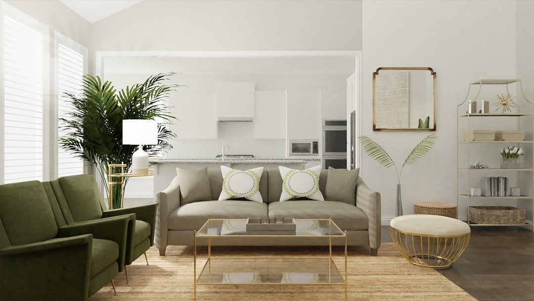 A serene and organized living room with minimal furniture and decorative elements, showcasing a decluttered space that promotes relaxation and functionality.